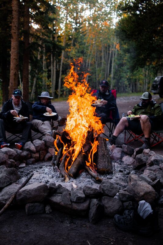 People gathered around a campfire